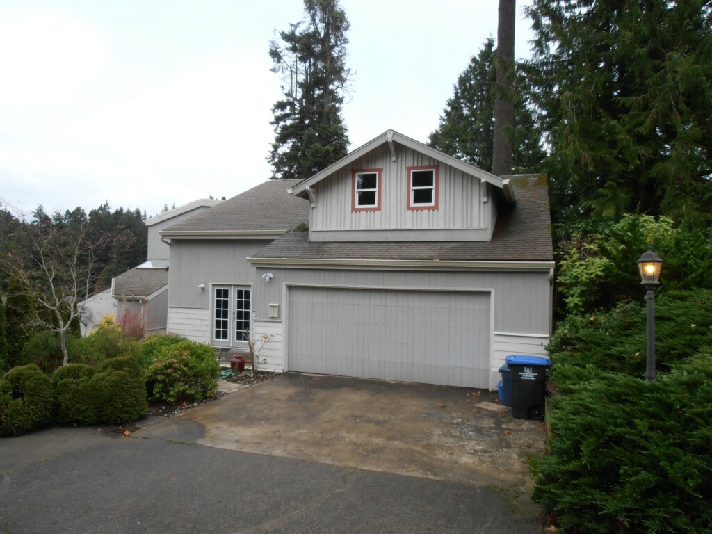 Property Photo:  8150 NE Hidden Cove Road  WA 98110 