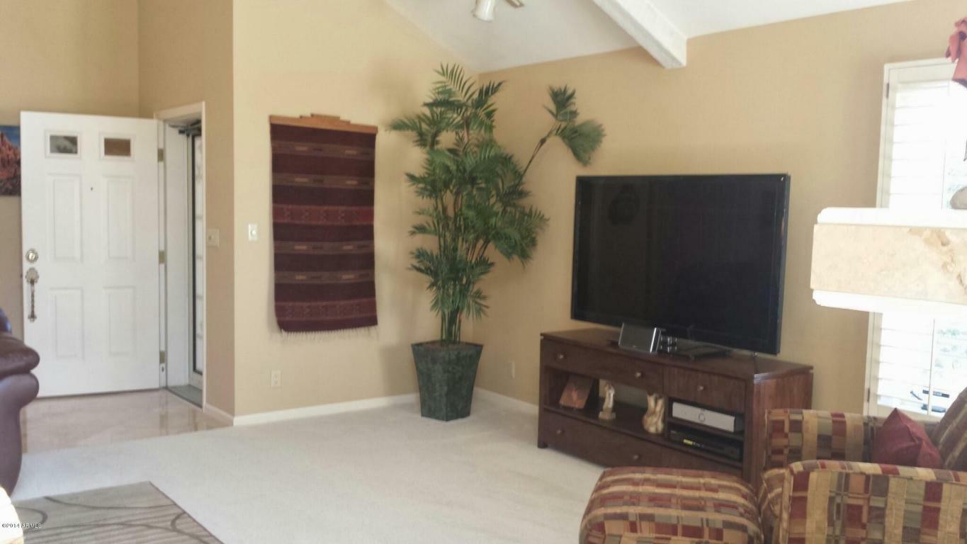 Property Photo:  16015 E El Lago Boulevard B-103  AZ 85268 