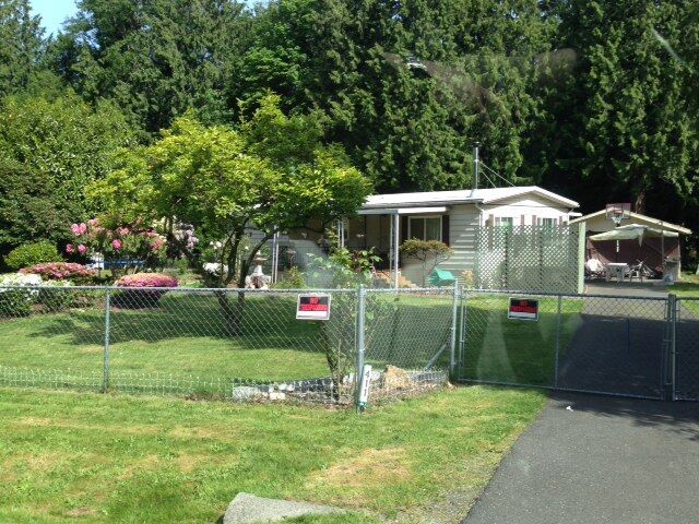 Property Photo:  411 205th St SW  WA 98036 