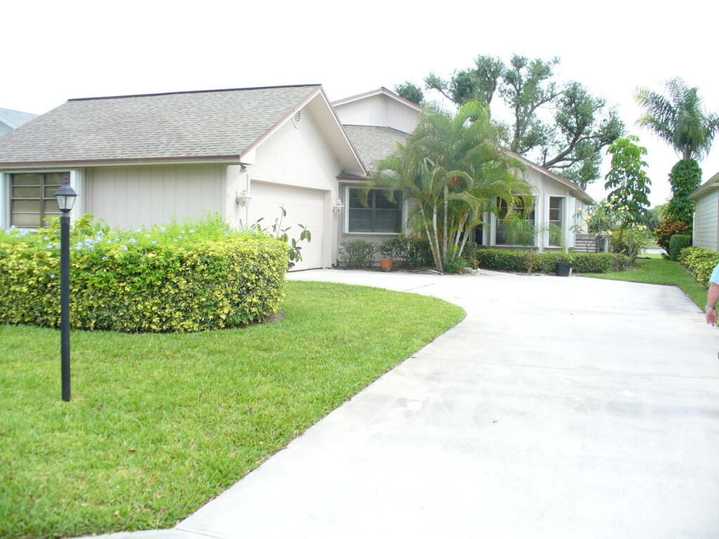 Property Photo:  6243 SE Ames Way  FL 33455 
