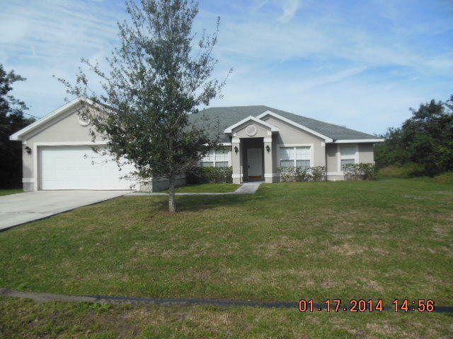 Property Photo:  1325 SW Idol Avenue  FL 34953 