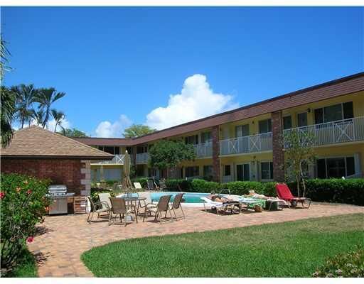 Property Photo:  1001 NE 8th Avenue 118  FL 33483 