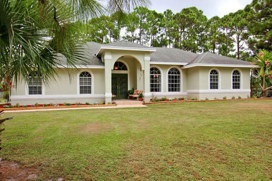 Property Photo:  15893 Tangerine Boulevard  FL 33470 