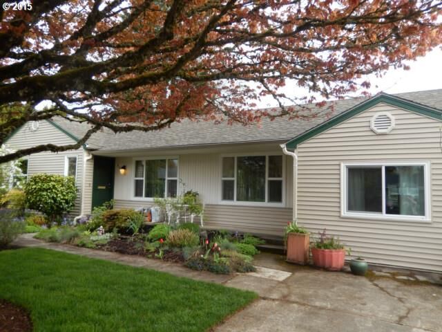 Property Photo:  945 NE Birchwood Dr  OR 97124 