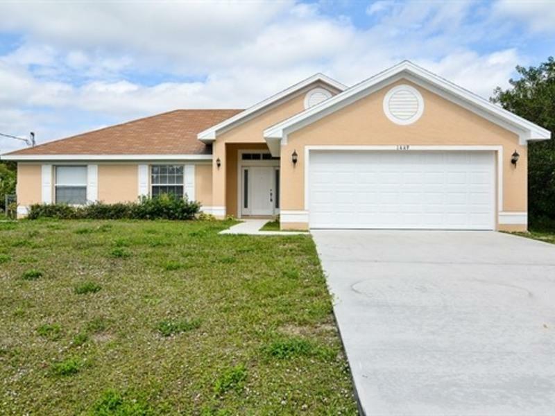 Property Photo:  1449 SW Stony Avenue  FL 34953 