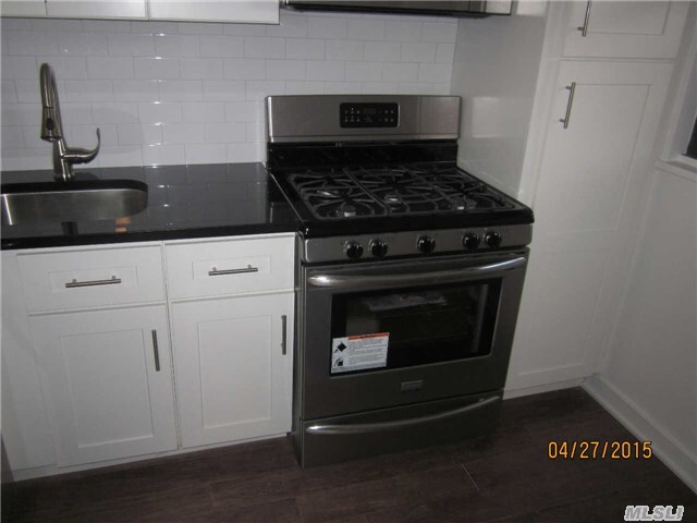 Property Photo: 61-55 98 St 1H NY 11374
