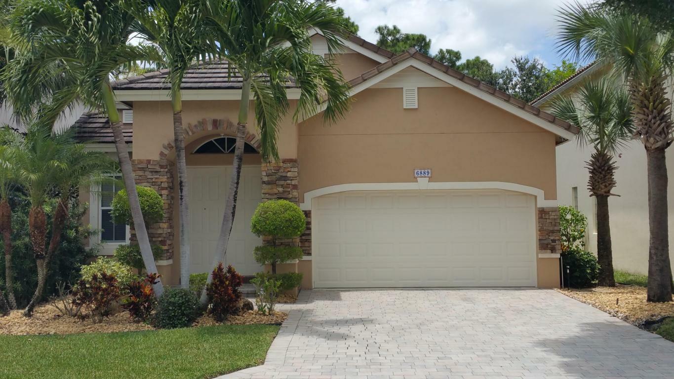 Property Photo:  6889 Spider Lily Lane  FL 33462 