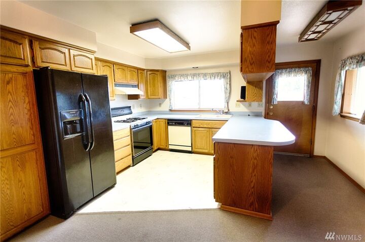 Property Photo:  8407 31st St W  WA 98466 
