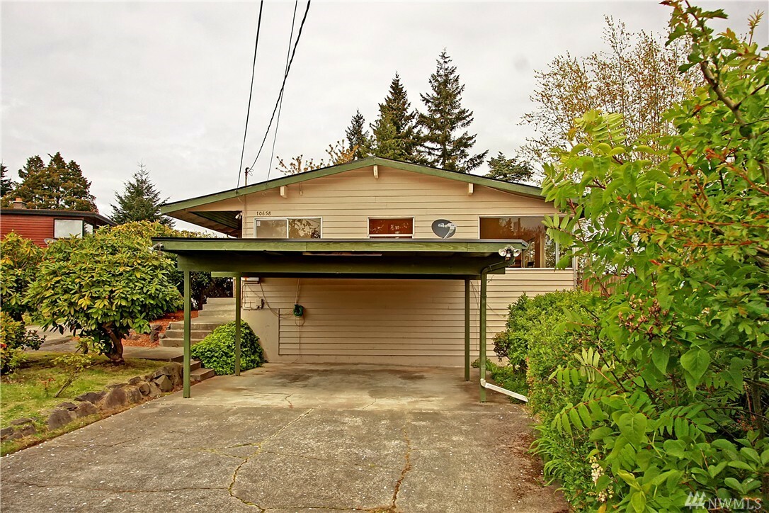 Property Photo:  10658 63rd Ave S  WA 98178 