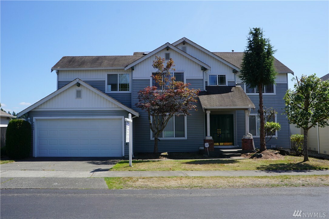 Property Photo:  6442 60th St W  WA 98467 