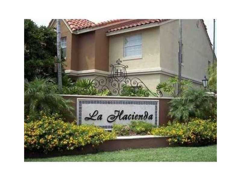 Property Photo:  18330 NW 68th Ave K  FL 33015 