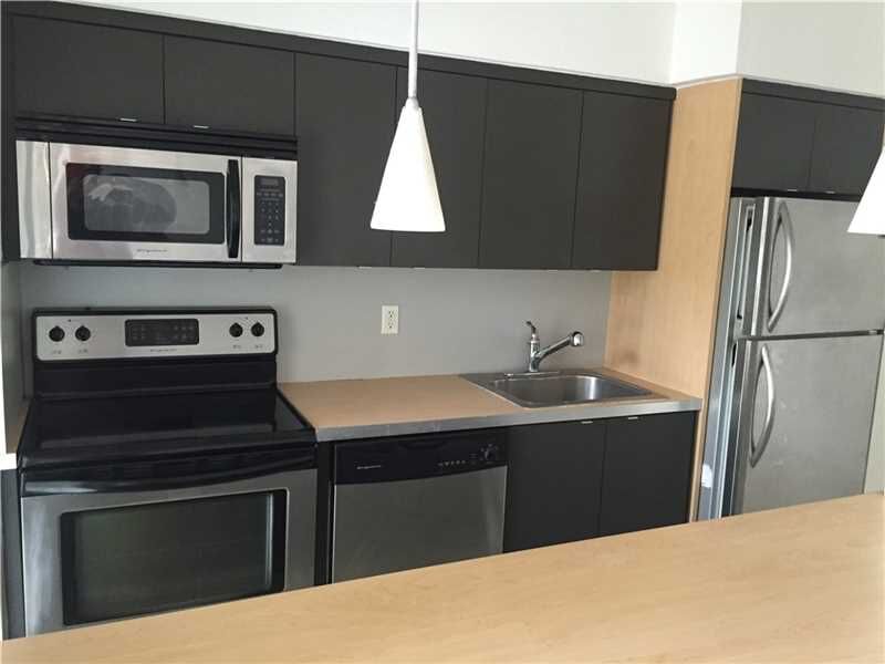 Property Photo: 6835 Rue Versailles 202 FL 33141