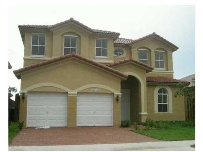 Property Photo:  11160 NW 77 Te  FL 33178 