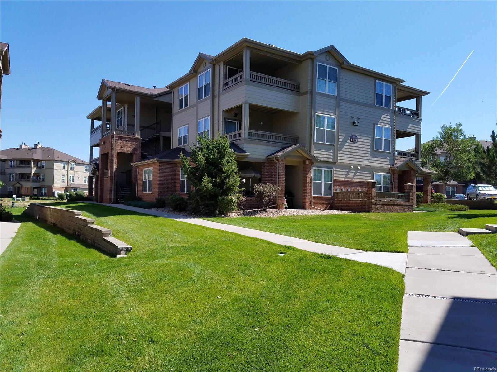 Property Photo:  12928 Ironstone Way Unit 104  CO 80134 
