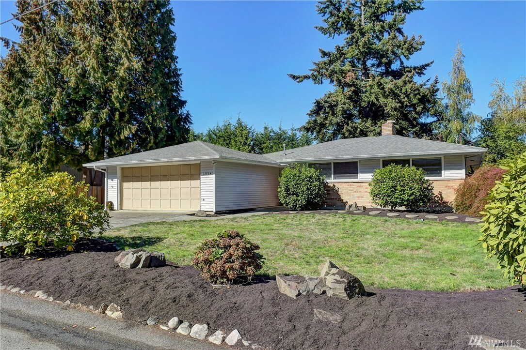 Property Photo:  11634 SE 49th St  WA 98006 