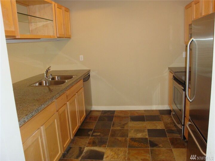 Property Photo:  300 110th Ave NE 311  WA 98004 