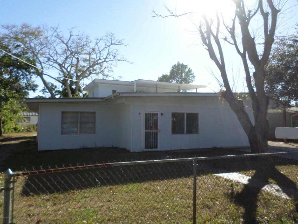 Property Photo:  309 Iris Street  FL 32927 