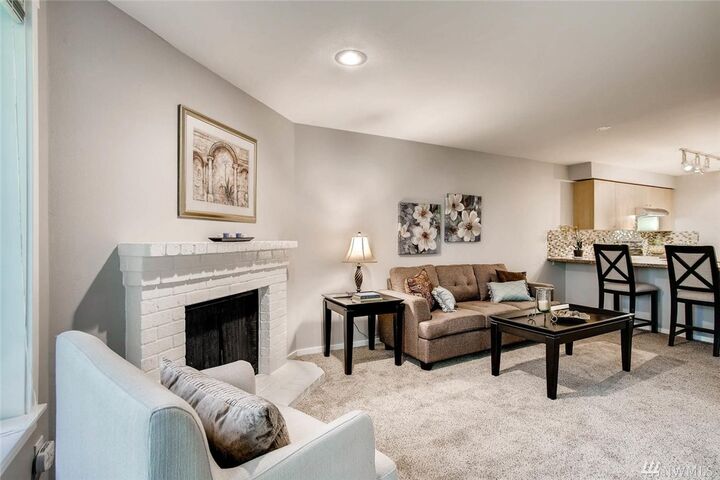 Property Photo:  11223 NE 128th St J302  WA 98034 