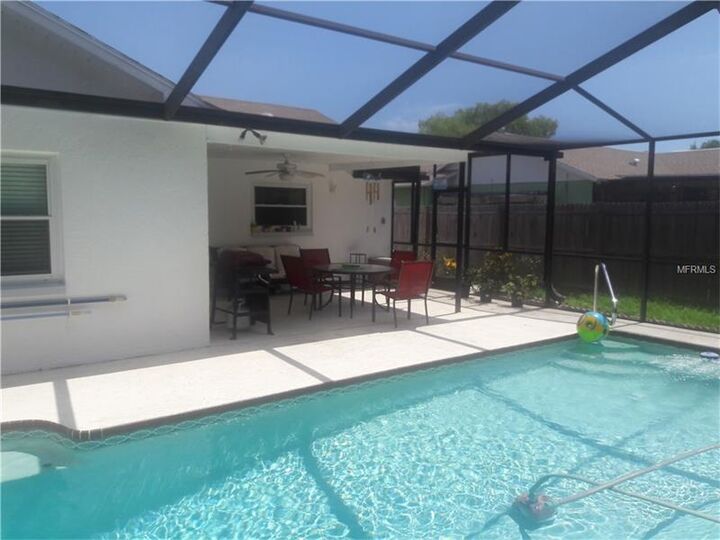 Property Photo:  7607 Bramblewood Drive  FL 34668 