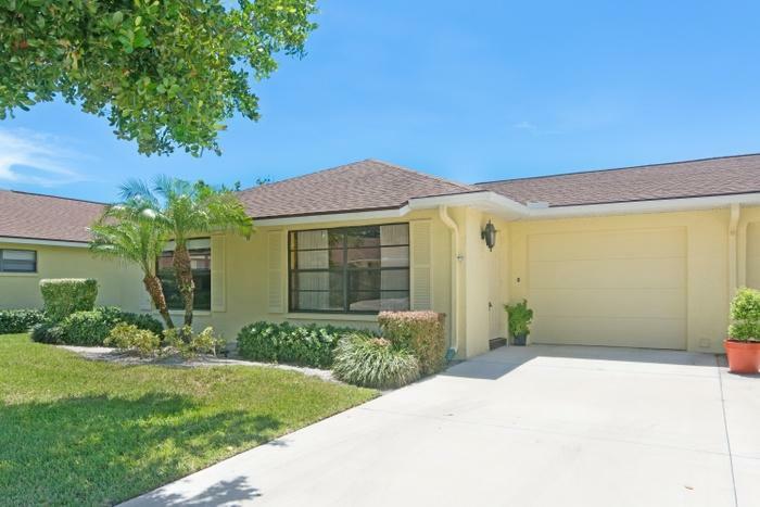 Property Photo:  9790 Tabebuia Tree Drive A  FL 33436 