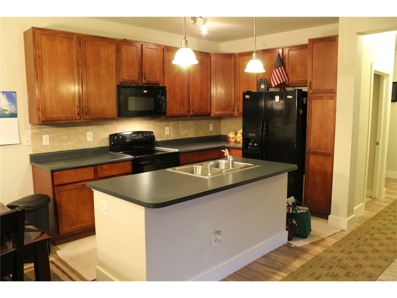 Property Photo: 14321 East Tennessee Avenue Unit 104 CO 80012