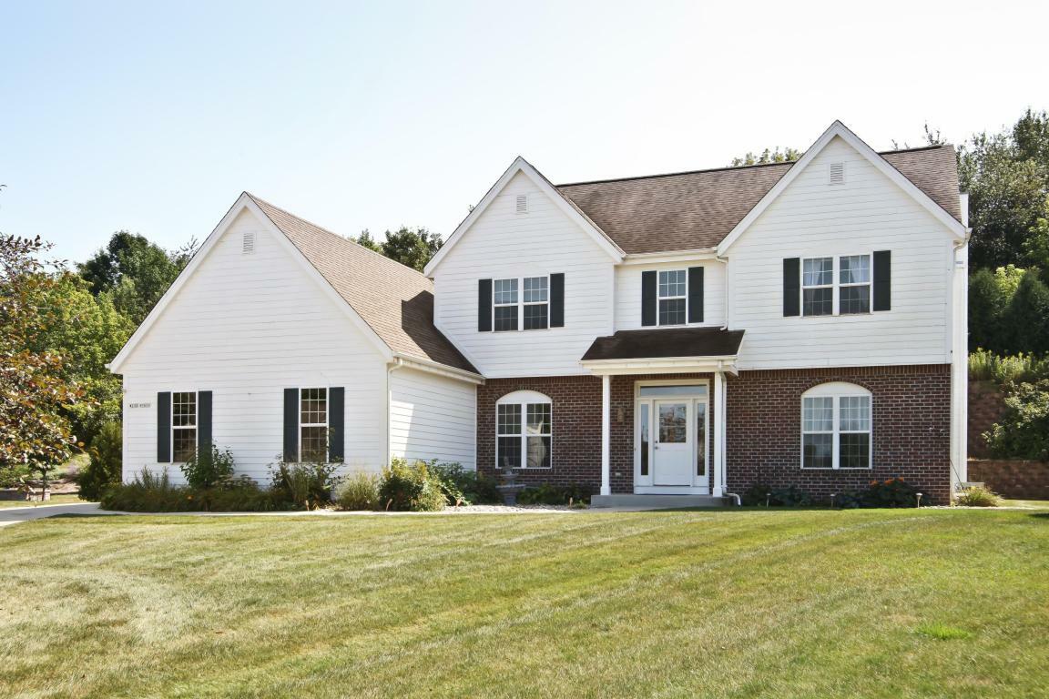 Property Photo: W232n7631 Habitat Ct WI 53089-1562