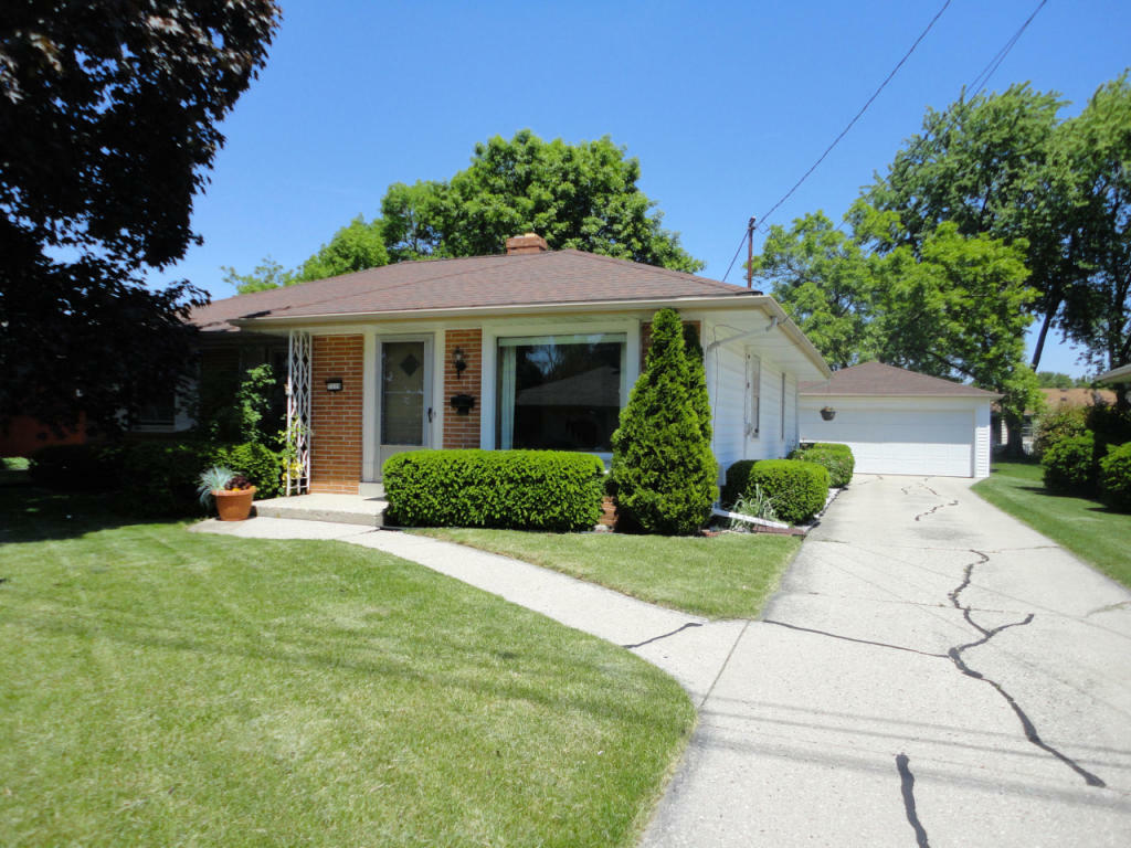 Property Photo:  7118 W Tripoli Ave  WI 53220 