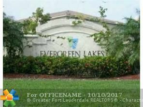 Property Photo:  5031 Wiles Rd 207  FL 33073 