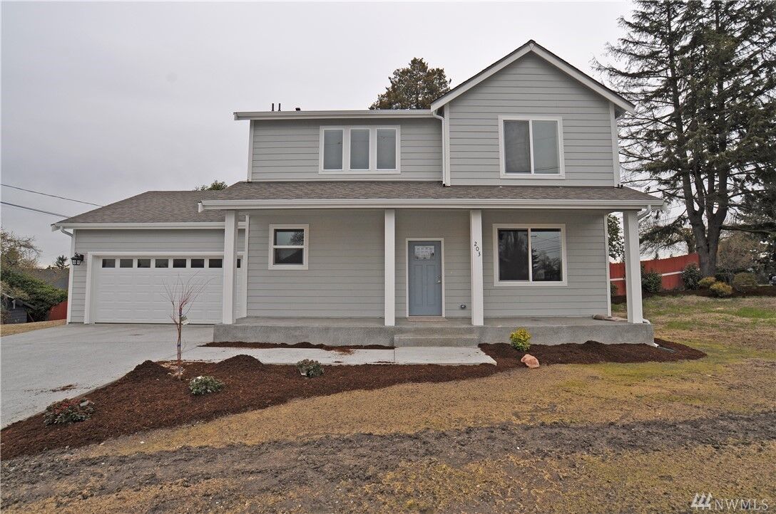 Property Photo:  203 S 68th St  WA 98408 