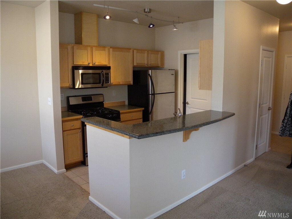 Property Photo:  525 225th Lane NE D304  WA 98074 