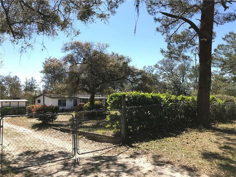 Property Photo:  32750 Watson Drive  FL 32720 