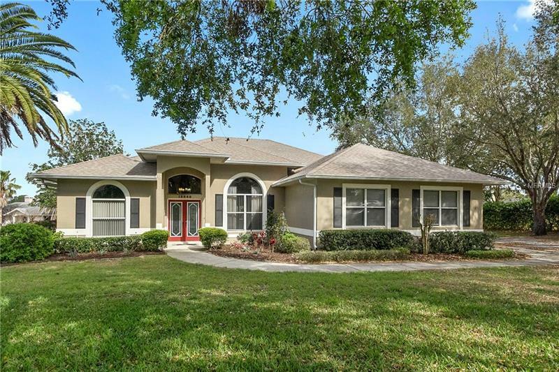 Property Photo:  12040 Garnet Drive  FL 34711 