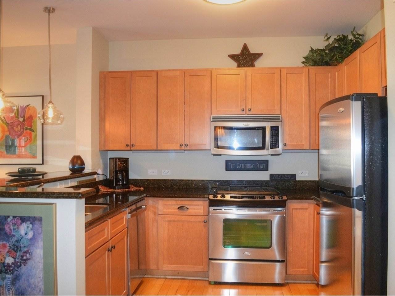 Property Photo: 60 Winooski Falls Way 1217 VT 05404