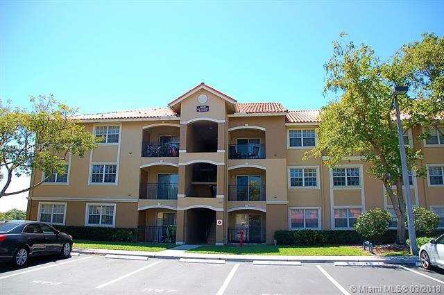 Property Photo:  11600 SW 2nd St 18-203  FL 33025 