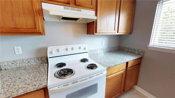 Property Photo:  1989 Toucan Way 100  FL 34232 