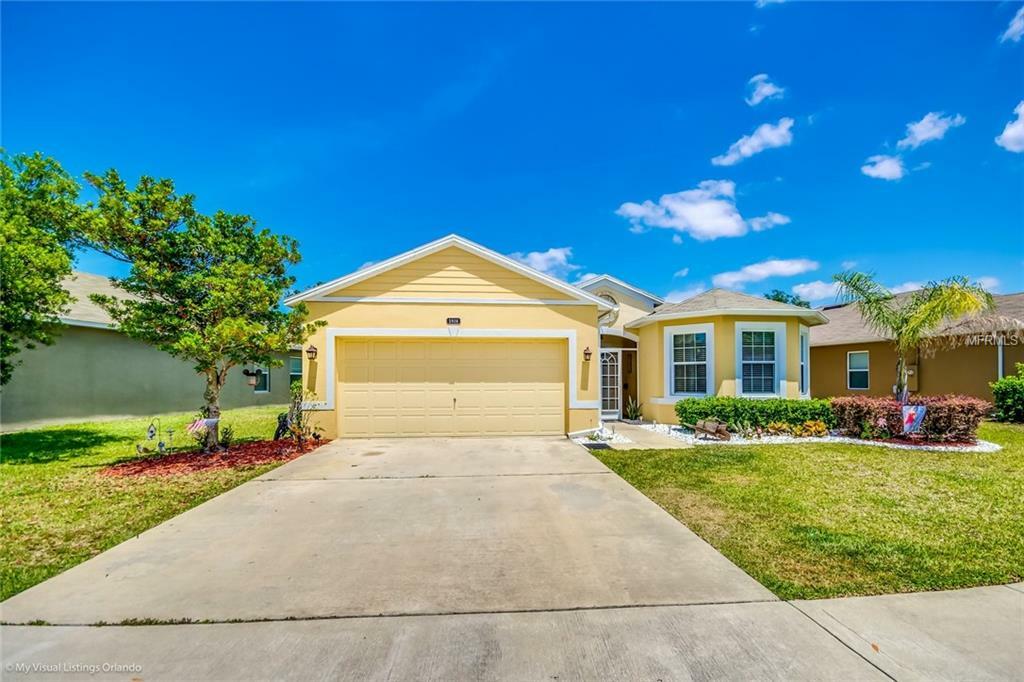 Property Photo:  5916 Windsong Oak Drive  FL 34748 