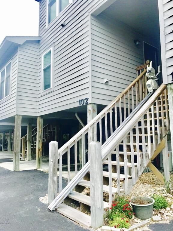 Property Photo:  102 Crosswinds Drive  NC 28445 