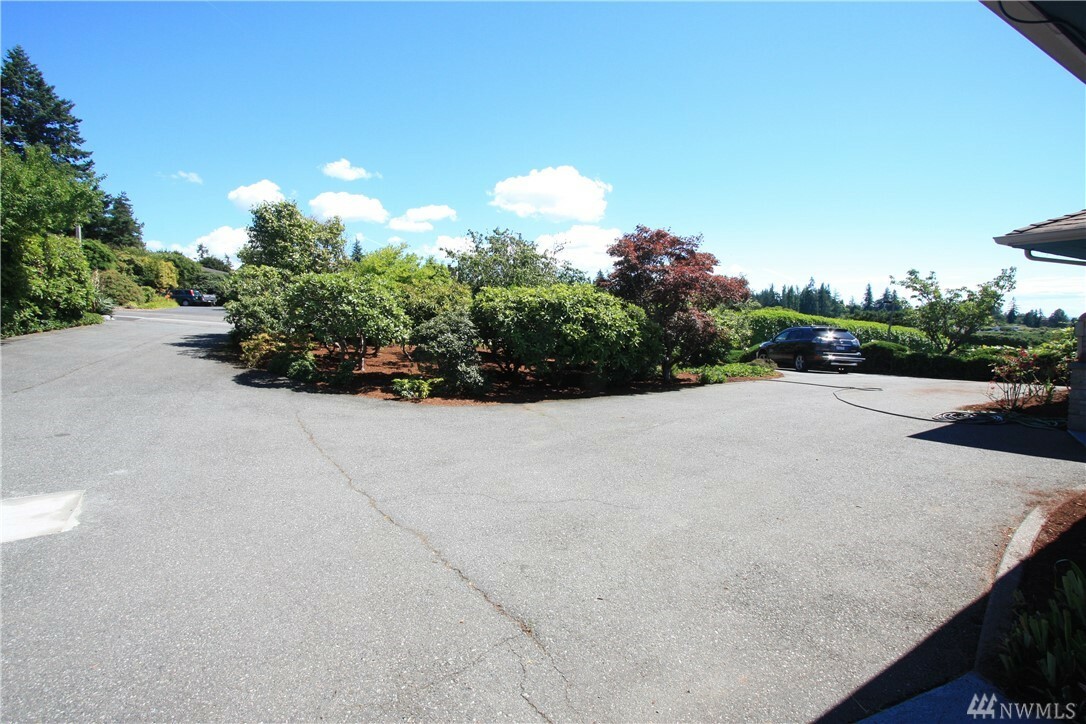 Property Photo:  838 NW Innis Arden Dr  WA 98177 