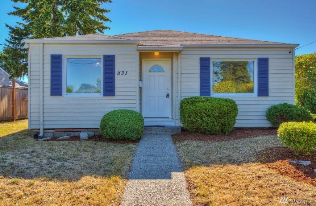 Property Photo:  831 S Howard St  WA 98465 