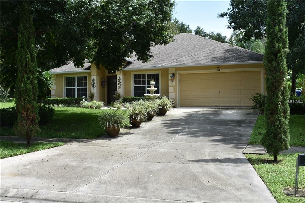 Property Photo:  1317 Canopy Oaks Drive  FL 34715 