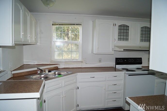 Property Photo:  101 E Mohler St  WA 98520 