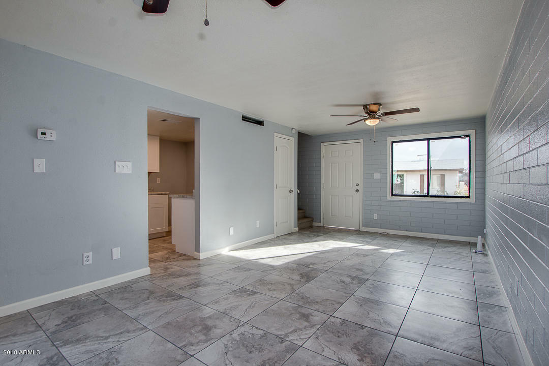 Property Photo:  7117 W Wolf Street  AZ 85033 