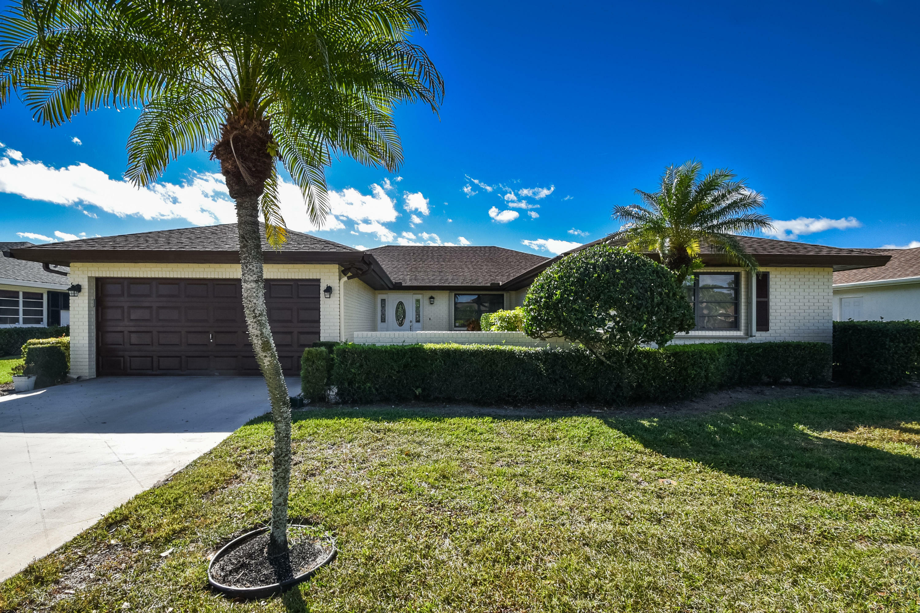 Property Photo:  10796 Greentrail Dr. S  FL 33436 