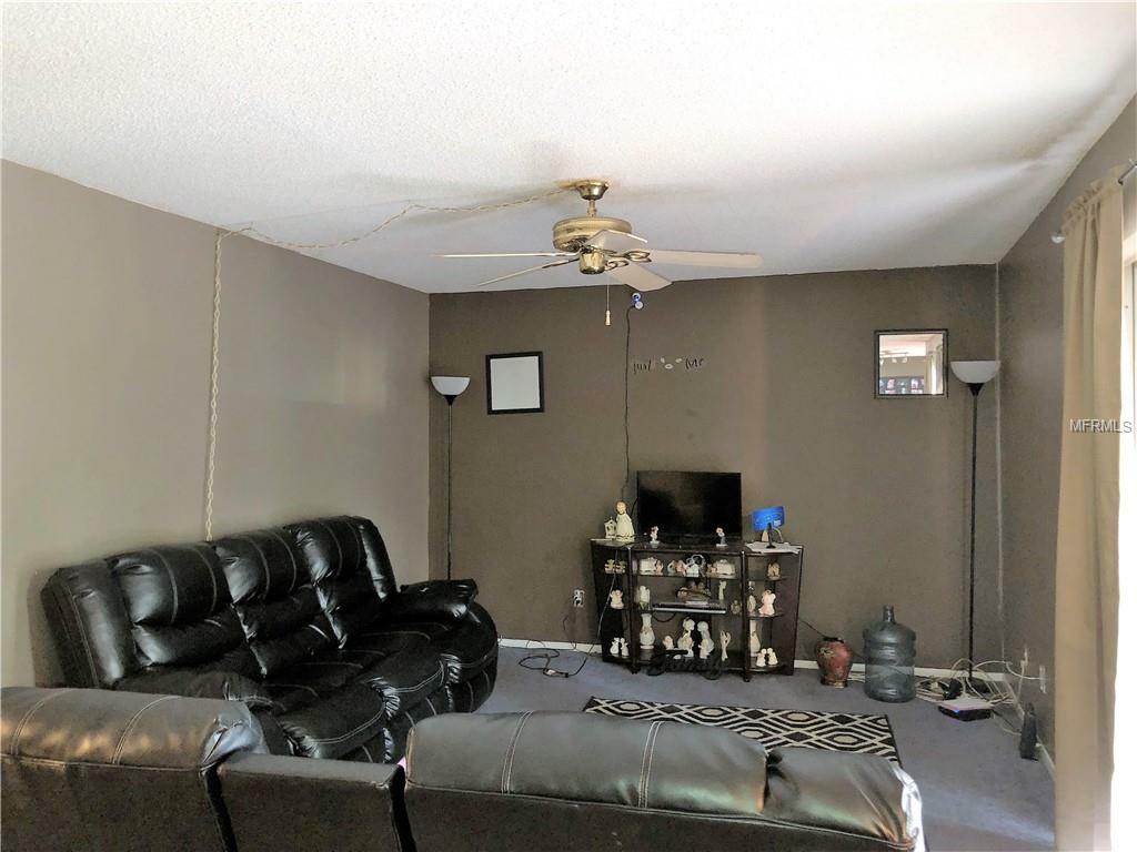 Property Photo:  5501 Pokeweed Court D  FL 33617 