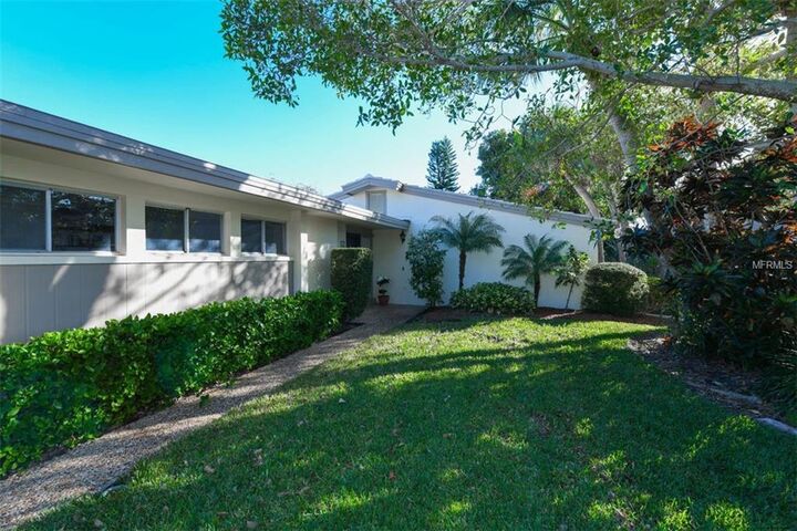 Property Photo:  124 Whispering Sands Circle V-17  FL 34242 