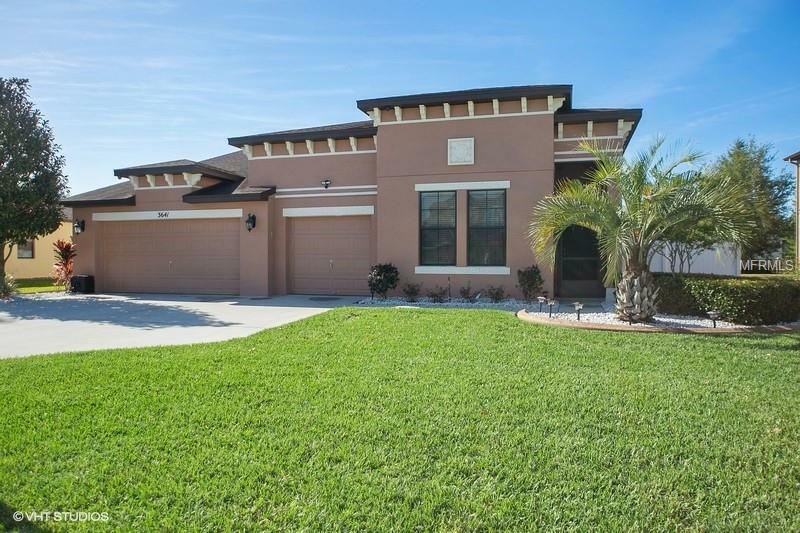 Property Photo:  3641 Foxchase Drive  FL 34711 