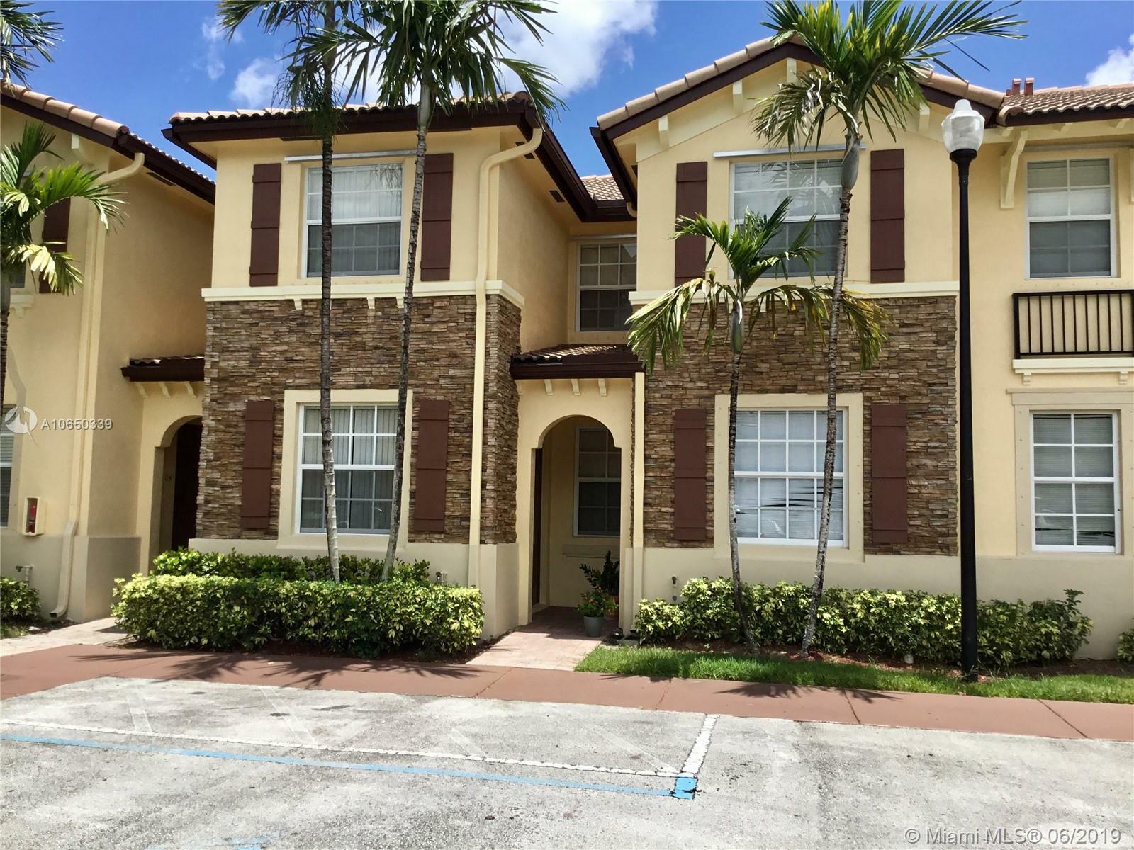 Property Photo:  1570 NE 33rd Rd 106-11  FL 33033 