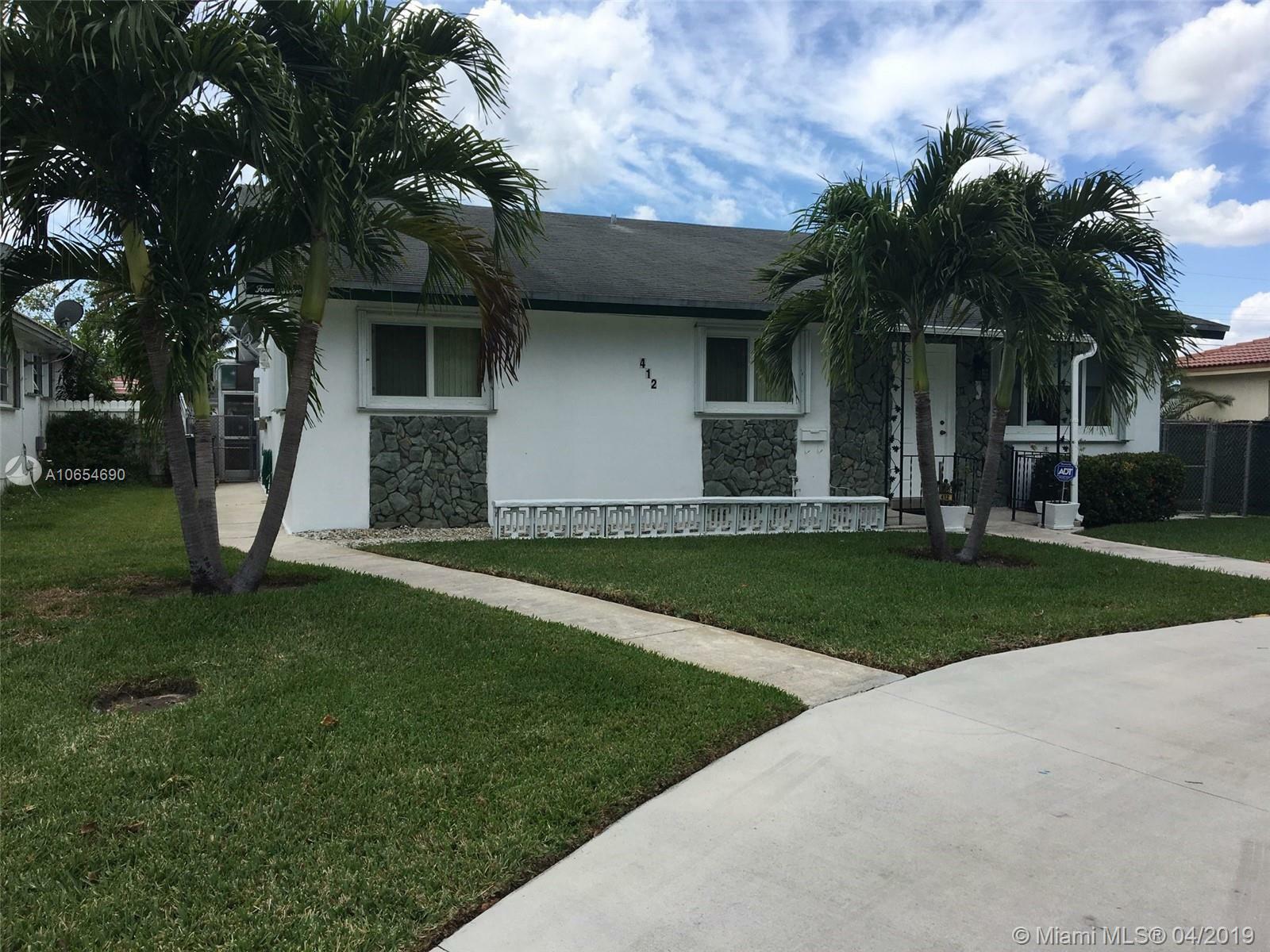 Property Photo:  412 SW 3rd Ter  FL 33009 