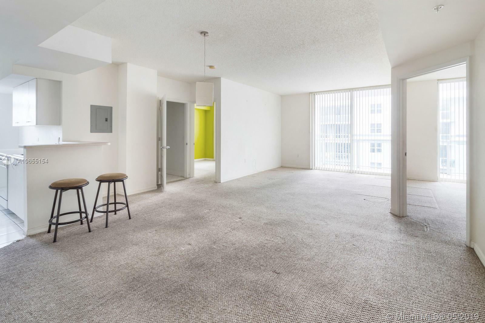 Property Photo: 5077 NW 7th St Ph-18 FL 33126