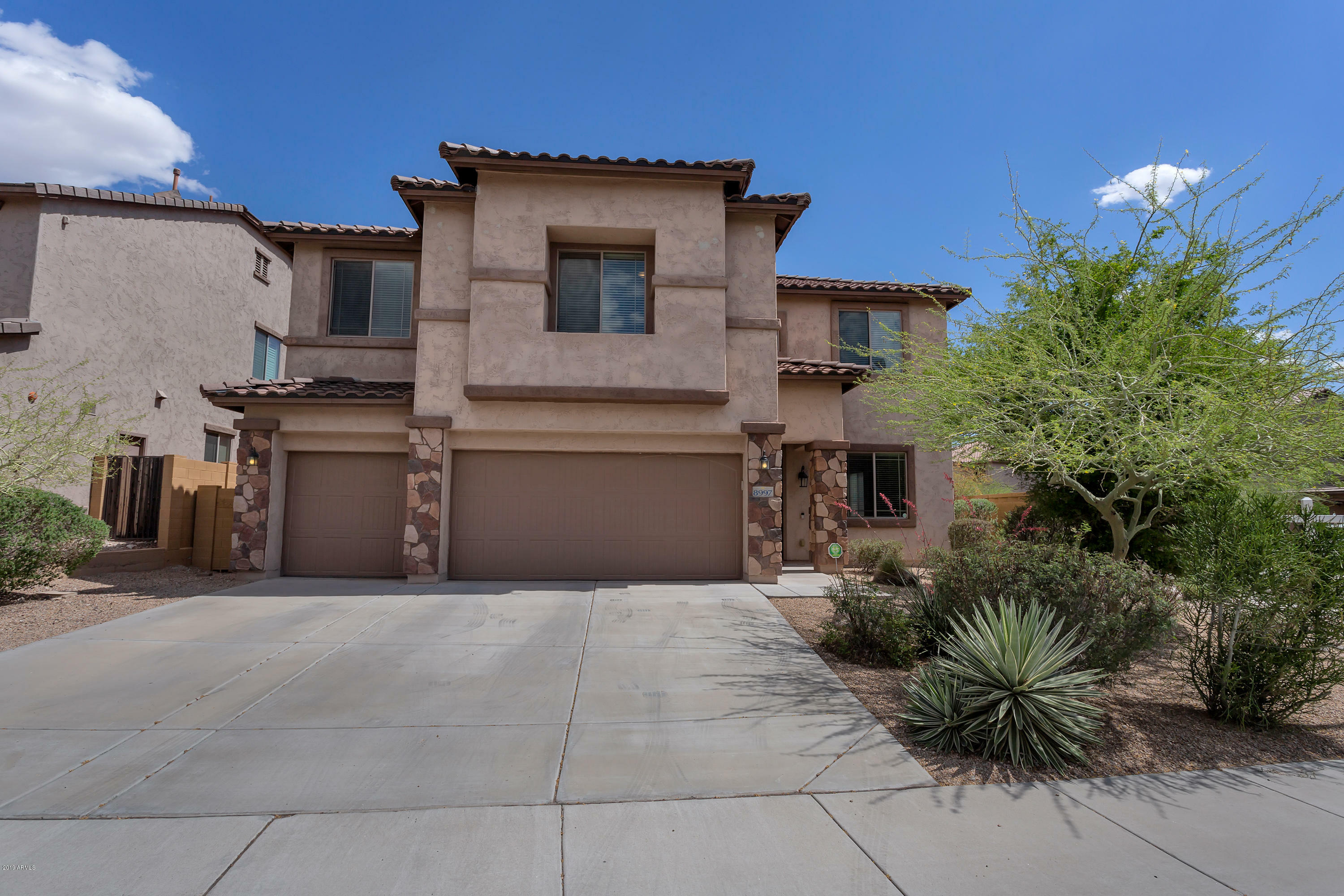 Property Photo:  8997 W Plum Road  AZ 85383 